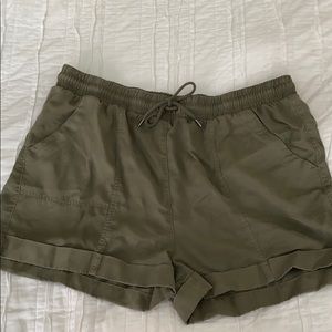 Olive green mid rise utility shorts